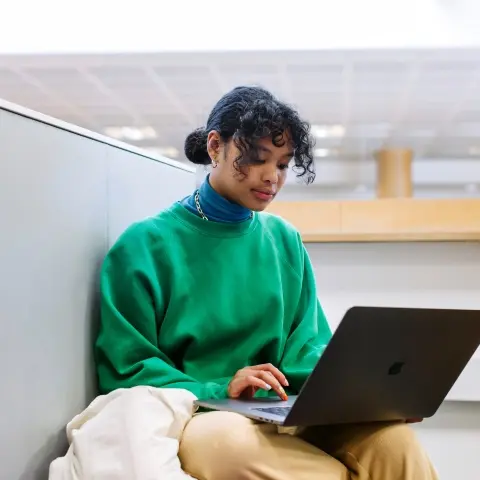 Student with a laptop learning 