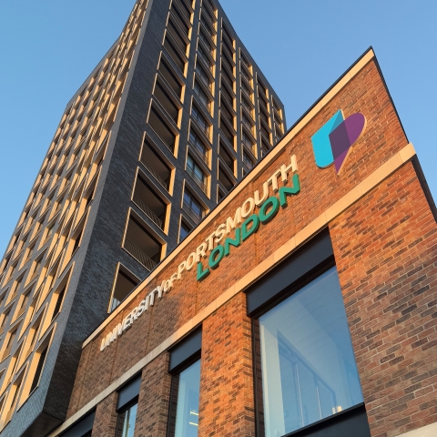 Outside Juniper House with sunset