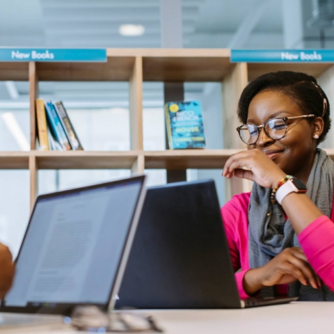 Student on a laptop in library 