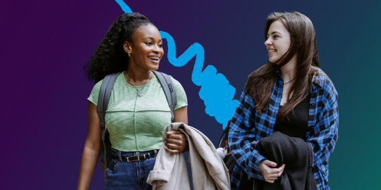 Two students smiling 