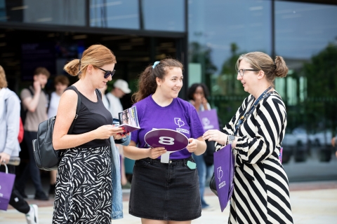 Student ambassador talking and helping visitors  - Open Day 2023