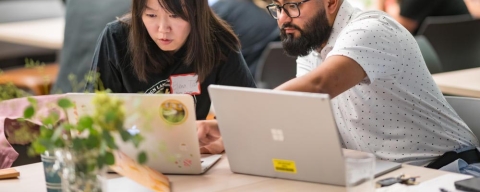 girl and boy at laptop