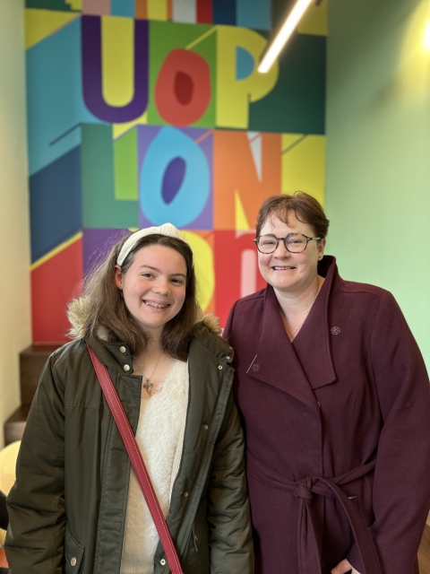 Two visitors at open day smiling