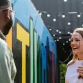 Students talking laughing together